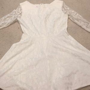 White long sleeved lace mini dress